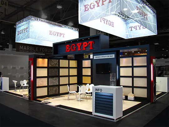 Custom country pavilion exhibition stand for Egypt showcasing natural stone tiles and national branding at Marmomac