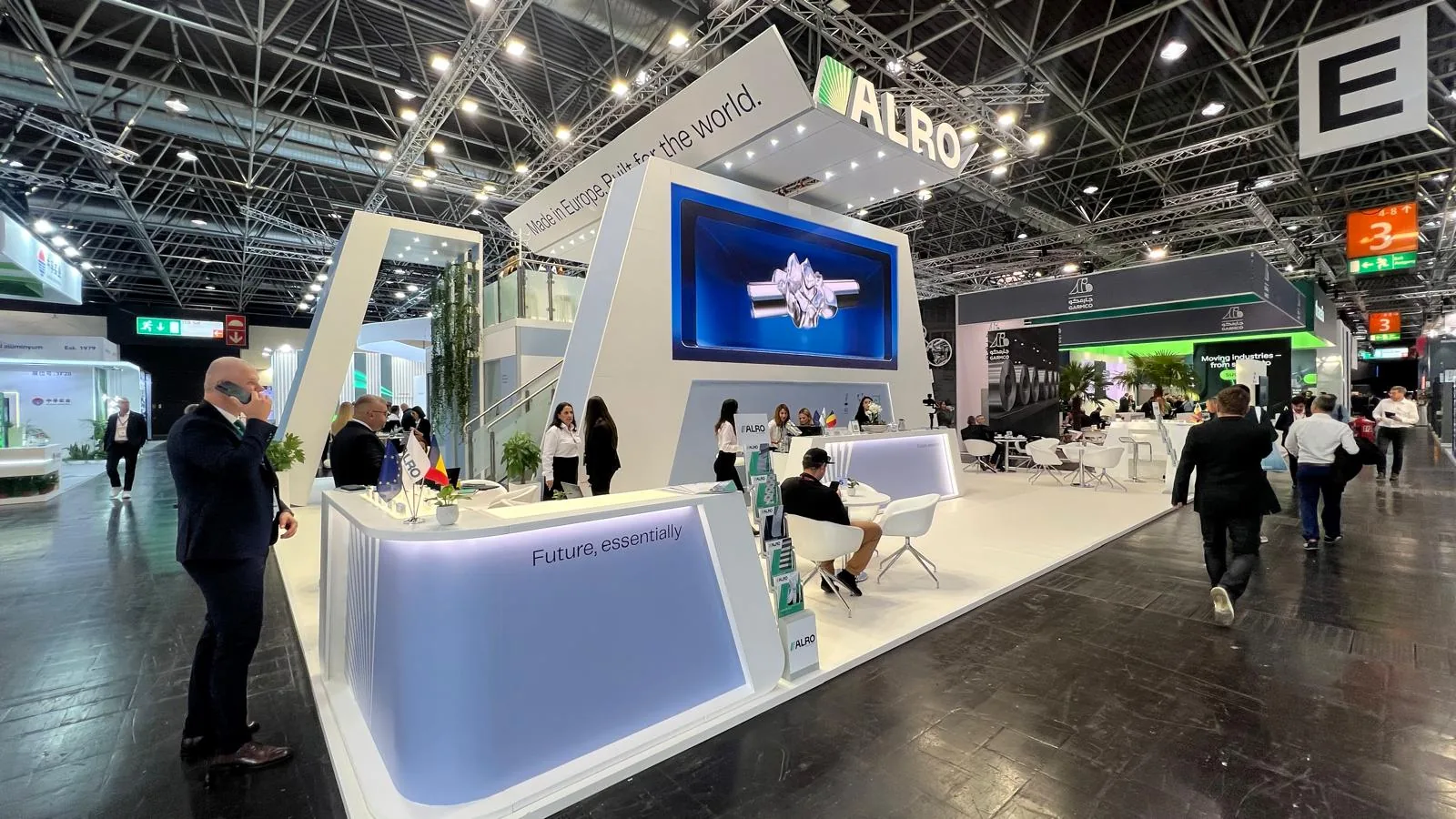 ALRO exhibition stand at ALUMINIUM 2026 Düsseldorf with LED video wall, reception desk and visitors