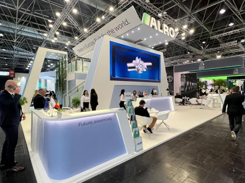 ALRO exhibition stand at ALUMINIUM 2026 Düsseldorf with LED video wall, reception desk and visitors
